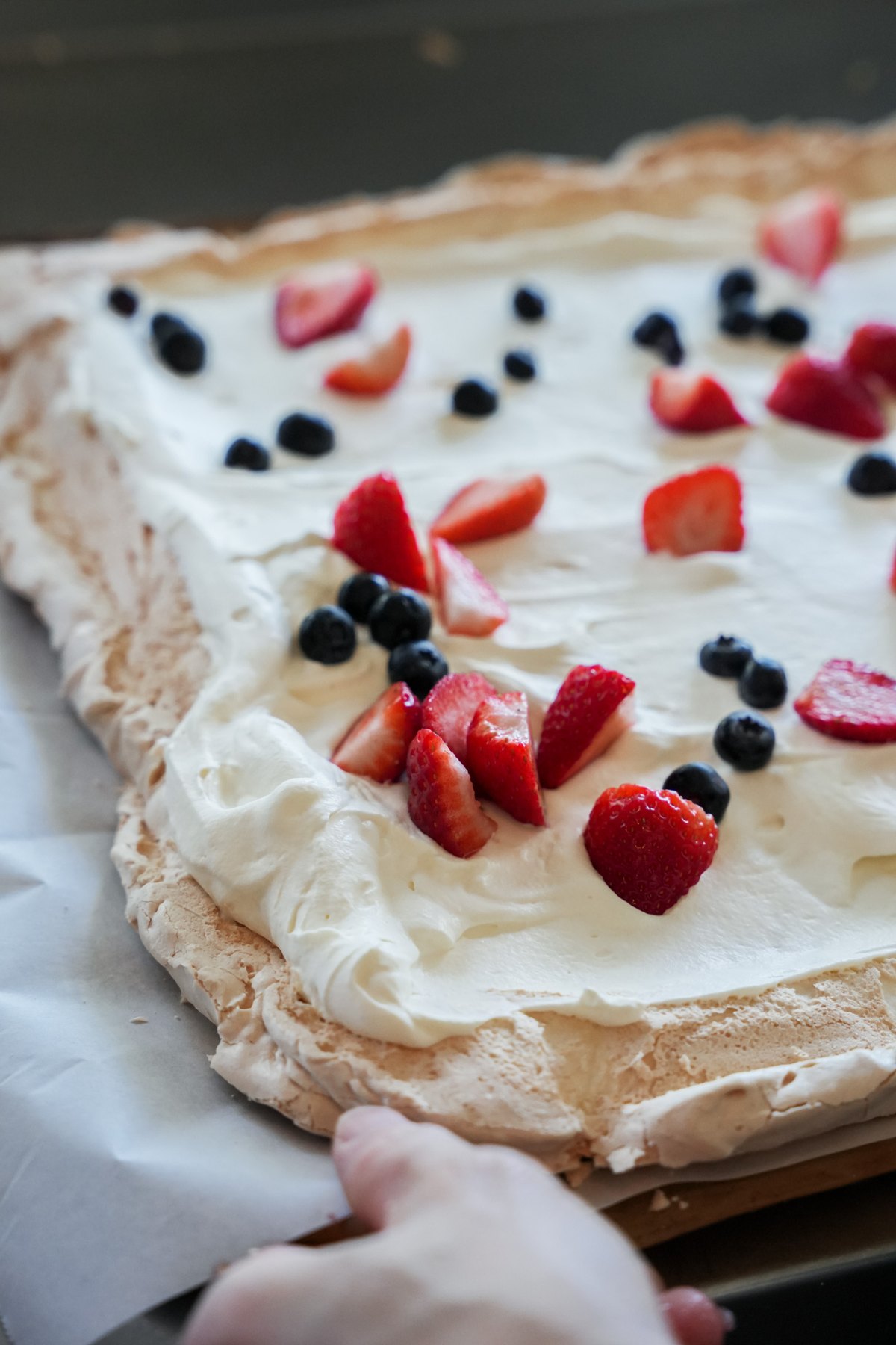 A berry-topped pavlova prepared at Fordham’s